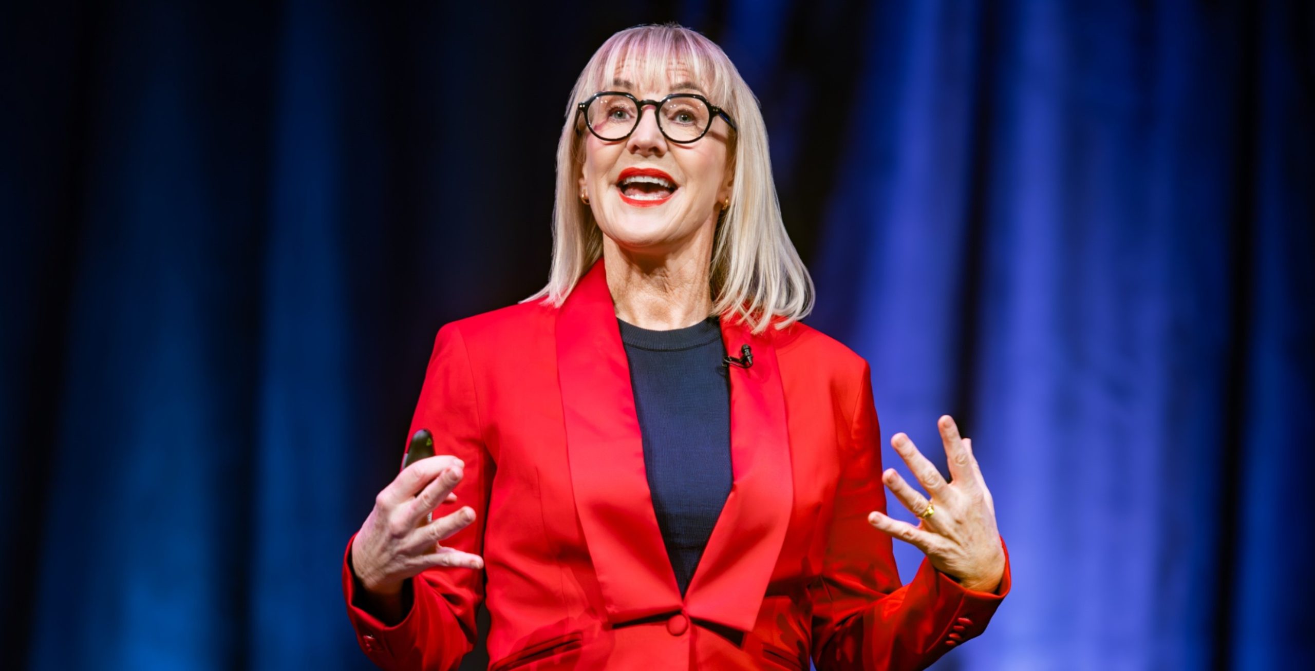 Dr Jo performing a comedy keynote